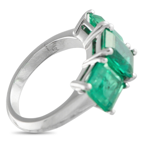 149 - A stunning Platinum 8.0ctw Colombian Emerald Three-Stone Ring. This platinum ring features three Col... 