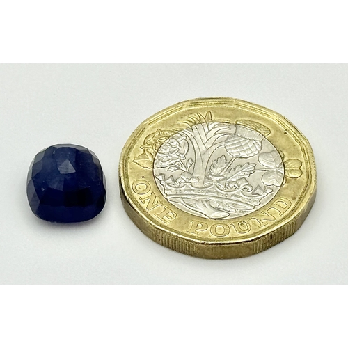 723 - A 6.88ct Faceted Madagascan Blue Sapphire Gemstone. Cushion shape. Colour enhanced. GLI certified. R... 