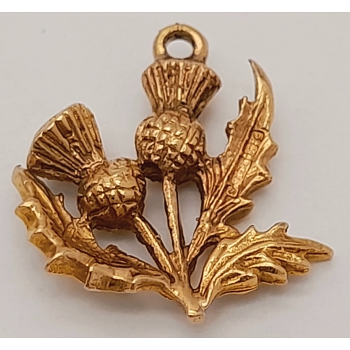 735 - A 9K Yellow Gold Thistle Pendant/Charm. 10mm. 1.7g.