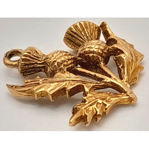735 - A 9K Yellow Gold Thistle Pendant/Charm. 10mm. 1.7g.