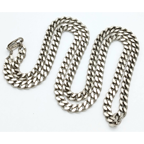754 - A STERLING SILVER HEAVY CURB CHAIN. 28