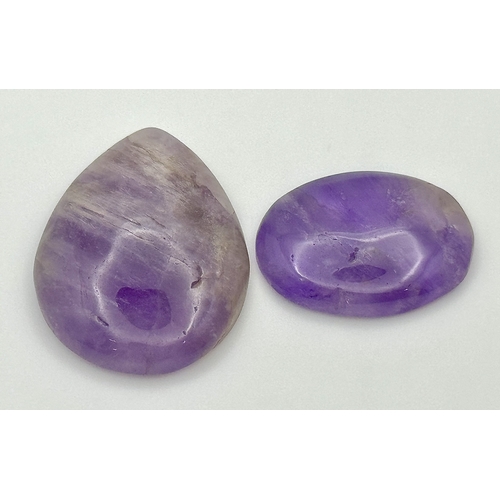 758 - Two Pieces of 86.50ctw Cabochon Amethyst Gemstones. Pear and oval shapes. Ref: V.C.43