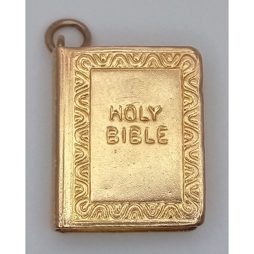 728 - A 9K Yellow Gold Holy Bible Pendant/Charm. 2cm. 1.4g.