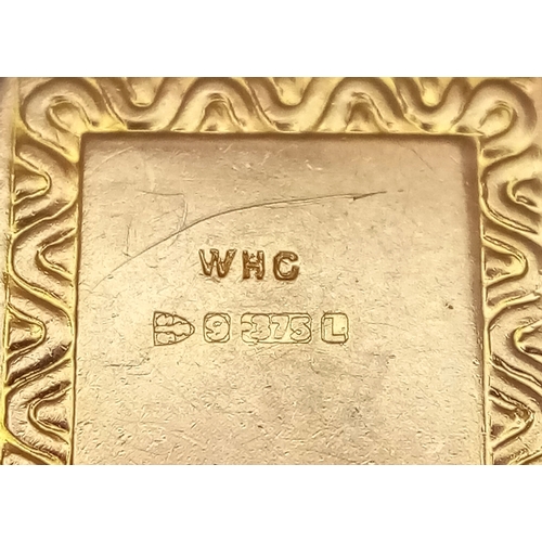 728 - A 9K Yellow Gold Holy Bible Pendant/Charm. 2cm. 1.4g.