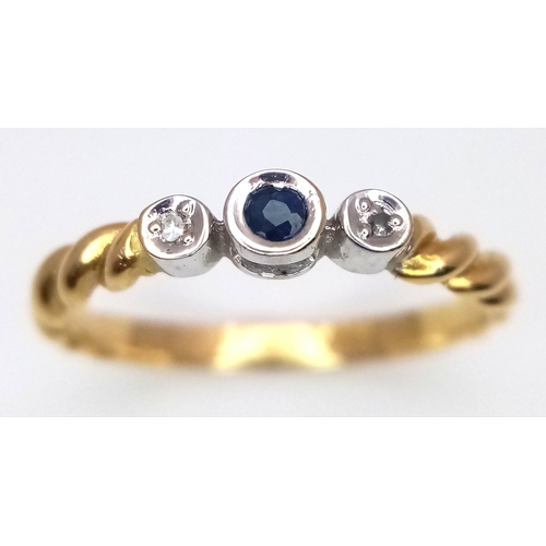 733 - AN 18K YELLOW GOLD DIAMOND AND SAPPHIRE RING. 1.9G. SIZE L. REF - SC4080.