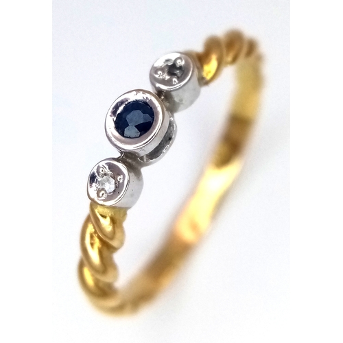 733 - AN 18K YELLOW GOLD DIAMOND AND SAPPHIRE RING. 1.9G. SIZE L. REF - SC4080.
