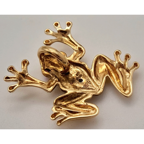 768 - A 9K YELLOW GOLD DIAMOND AND RUBY SET FROG PENDANT. 1.7G. REF - SC-4018.