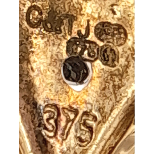 768 - A 9K YELLOW GOLD DIAMOND AND RUBY SET FROG PENDANT. 1.7G. REF - SC-4018.