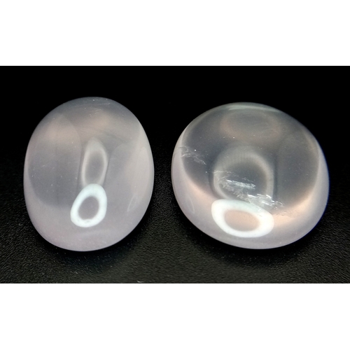 779 - Two Pieces of 52.30ctw Cabochon Rose Quartz Gemstones. Oval shapes. Ref: V.C.45