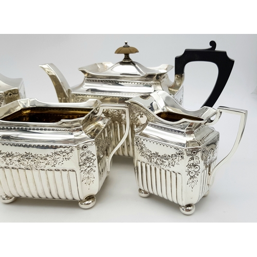 359 - A Wonderful, Antique Victorian Tea and Coffee Sterling Silver Set. A square shaped body set with orn... 