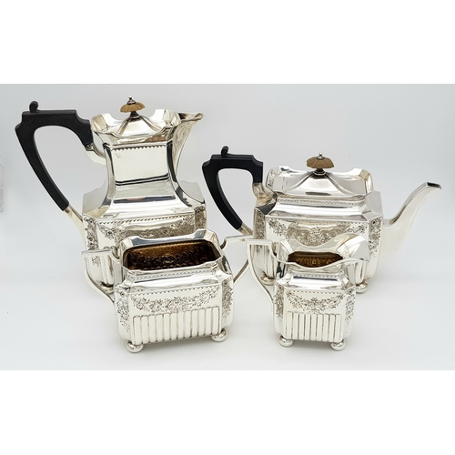 359 - A Wonderful, Antique Victorian Tea and Coffee Sterling Silver Set. A square shaped body set with orn... 