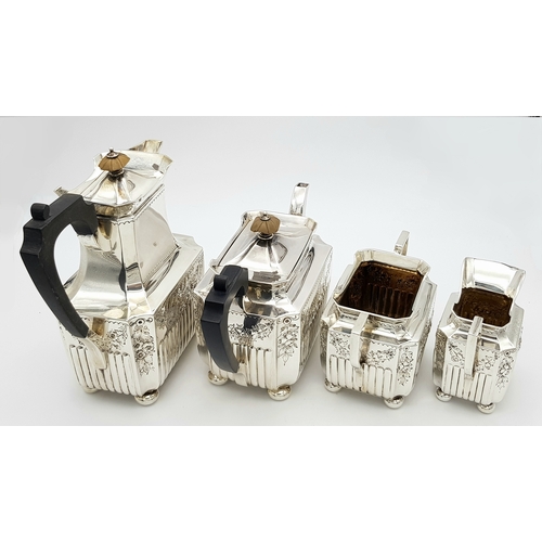 359 - A Wonderful, Antique Victorian Tea and Coffee Sterling Silver Set. A square shaped body set with orn... 