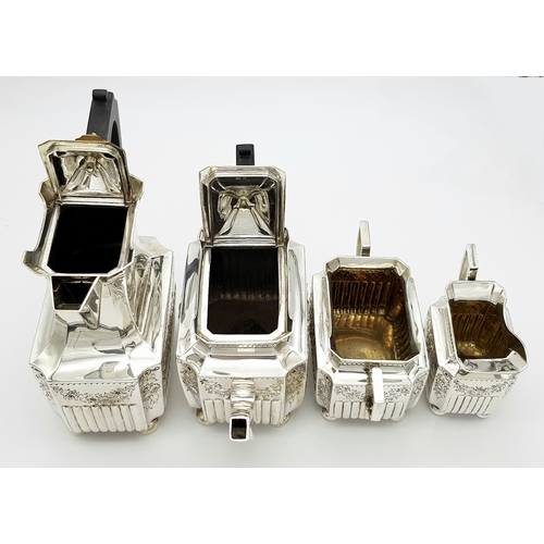 359 - A Wonderful, Antique Victorian Tea and Coffee Sterling Silver Set. A square shaped body set with orn... 