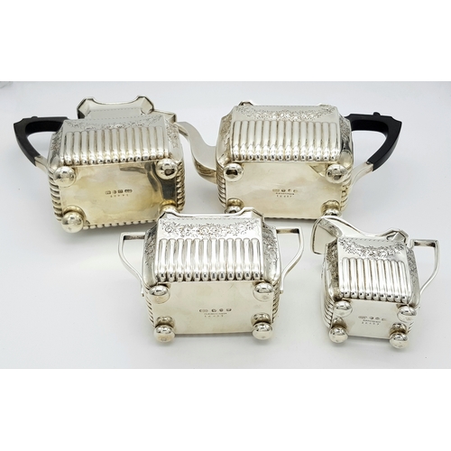 359 - A Wonderful, Antique Victorian Tea and Coffee Sterling Silver Set. A square shaped body set with orn... 