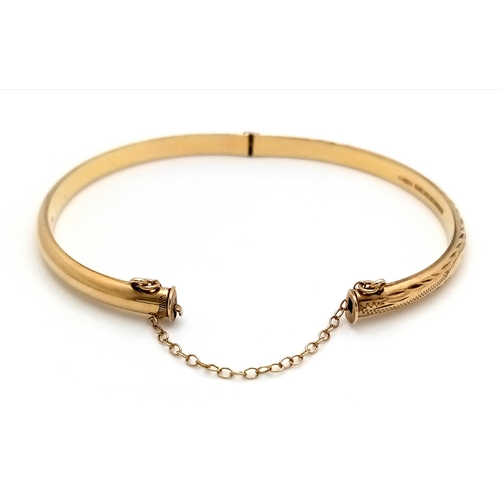 A 9K Yellow Gold Bangle. Clip open design with safety chain. 5mm width ...