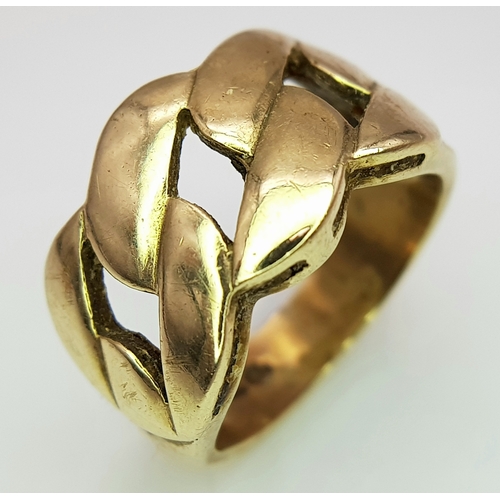 1 - A GENTS 9K GOLD RING WITH DISTINCTIVE PIERCED DESIGN.      6.9gms    size O