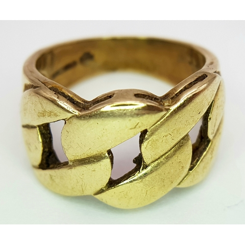1 - A GENTS 9K GOLD RING WITH DISTINCTIVE PIERCED DESIGN.      6.9gms    size O