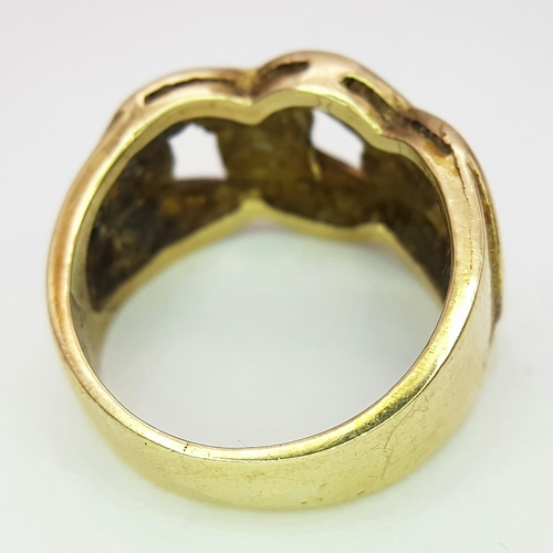 1 - A GENTS 9K GOLD RING WITH DISTINCTIVE PIERCED DESIGN.      6.9gms    size O
