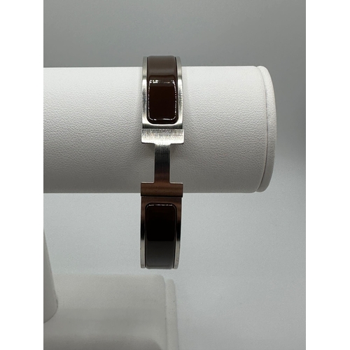 115 - A Hermes Click HH Bracelet Brushed Palladium & Brown Enamel Bangle. Comes with Box & Jewellery Bag (... 