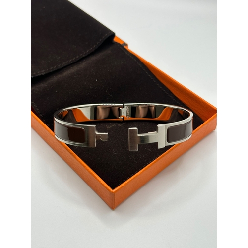 115 - A Hermes Click HH Bracelet Brushed Palladium & Brown Enamel Bangle. Comes with Box & Jewellery Bag (... 