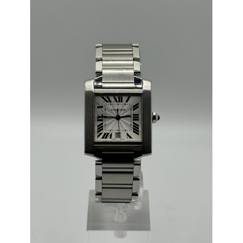 72 - A Cartier 2302  Stainless Steel Tank Watch. Year 2009, 28mm case with date box, comes with papers. I... 