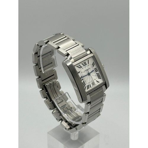 72 - A Cartier 2302  Stainless Steel Tank Watch. Year 2009, 28mm case with date box, comes with papers. I... 