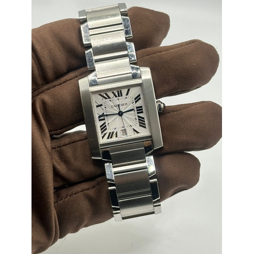 72 - A Cartier 2302  Stainless Steel Tank Watch. Year 2009, 28mm case with date box, comes with papers. I... 
