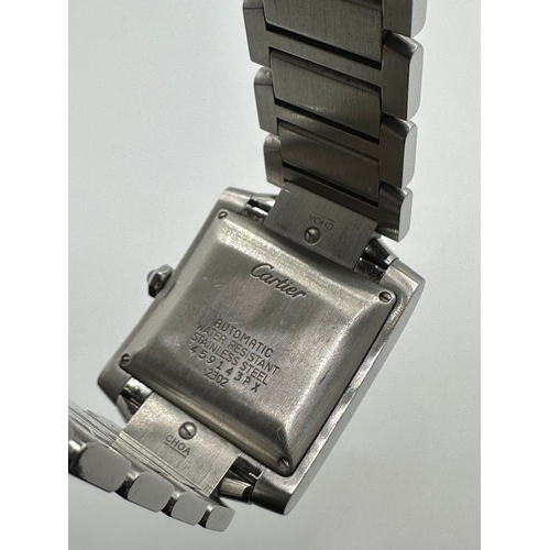 72 - A Cartier 2302  Stainless Steel Tank Watch. Year 2009, 28mm case with date box, comes with papers. I... 