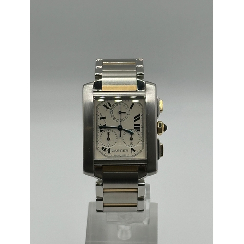 79 - A Cartier 2303 Tank Francaise Watch. Bi metal (18k yellow gold and stainless steel) strap. Year 2007... 