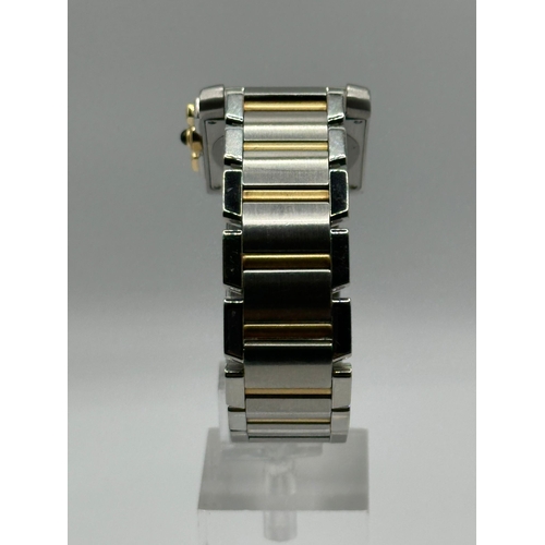 79 - A Cartier 2303 Tank Francaise Watch. Bi metal (18k yellow gold and stainless steel) strap. Year 2007... 