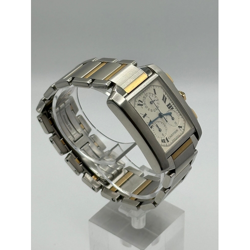 79 - A Cartier 2303 Tank Francaise Watch. Bi metal (18k yellow gold and stainless steel) strap. Year 2007... 
