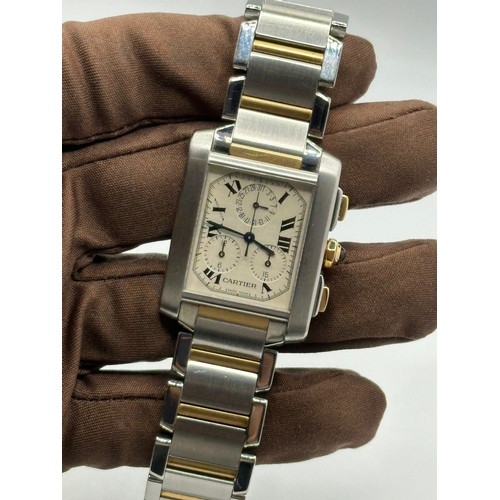 79 - A Cartier 2303 Tank Francaise Watch. Bi metal (18k yellow gold and stainless steel) strap. Year 2007... 