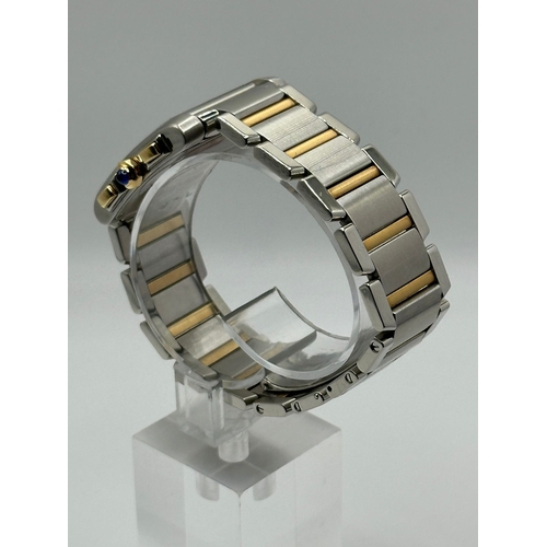 79 - A Cartier 2303 Tank Francaise Watch. Bi metal (18k yellow gold and stainless steel) strap. Year 2007... 