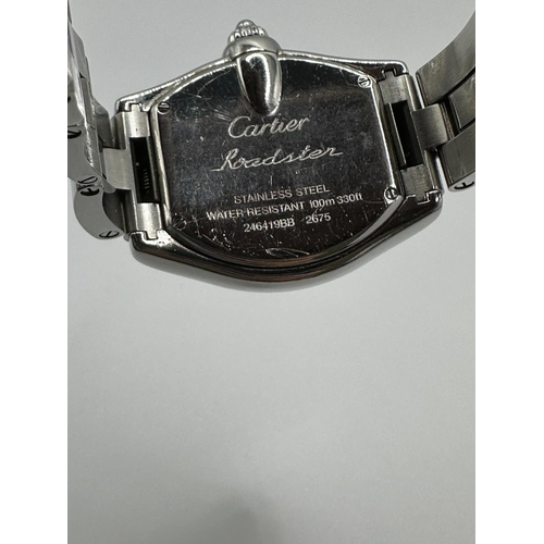 93 - A Cartier 2675 Stainless Steel Roadster watch. 33mm case, white dial with Roman numerals, year 2005.... 