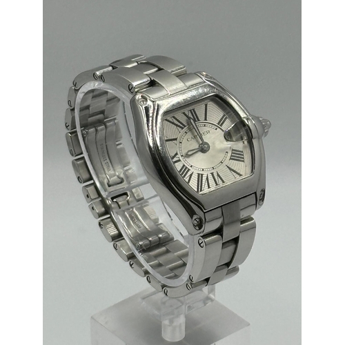 93 - A Cartier 2675 Stainless Steel Roadster watch. 33mm case, white dial with Roman numerals, year 2005.... 