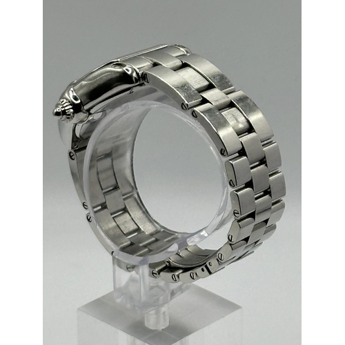 93 - A Cartier 2675 Stainless Steel Roadster watch. 33mm case, white dial with Roman numerals, year 2005.... 