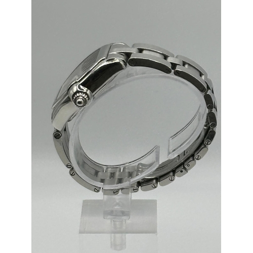 93 - A Cartier 2675 Stainless Steel Roadster watch. 33mm case, white dial with Roman numerals, year 2005.... 