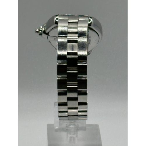 93 - A Cartier 2675 Stainless Steel Roadster watch. 33mm case, white dial with Roman numerals, year 2005.... 