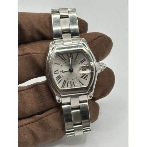 93 - A Cartier 2675 Stainless Steel Roadster watch. 33mm case, white dial with Roman numerals, year 2005.... 
