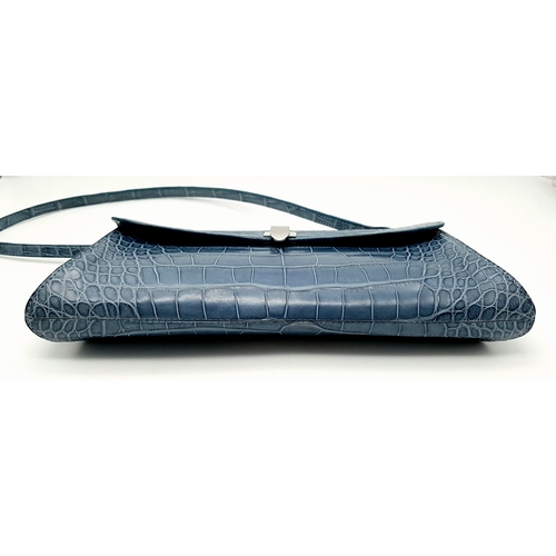 90 - An Asprey Blue Alligator Leather Handbag. Silver toned hardware. Shoulder strap. Blue leather interi... 
