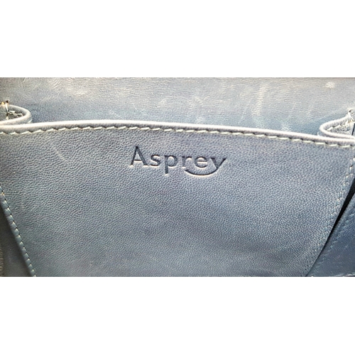 90 - An Asprey Blue Alligator Leather Handbag. Silver toned hardware. Shoulder strap. Blue leather interi... 