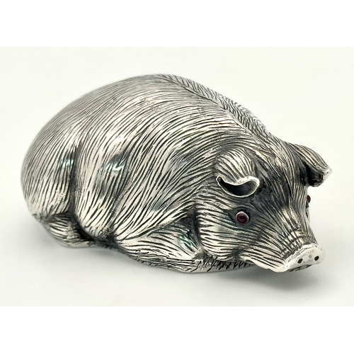 64 - An Antique Faberge Silver Pig Figurine with Ruby Eyes. Faberge mark. Head 88 mark. 6cm length. 30.3g... 
