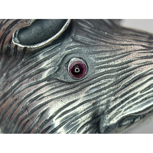 64 - An Antique Faberge Silver Pig Figurine with Ruby Eyes. Faberge mark. Head 88 mark. 6cm length. 30.3g... 