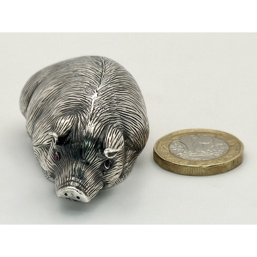 64 - An Antique Faberge Silver Pig Figurine with Ruby Eyes. Faberge mark. Head 88 mark. 6cm length. 30.3g... 