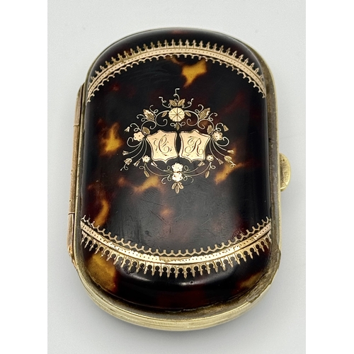 86 - An Antique (possibly French) Faux Tortoiseshell Small Purse. 
Silk interior is in fair condition for... 