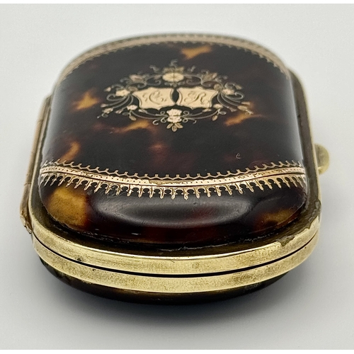 86 - An Antique (possibly French) Faux Tortoiseshell Small Purse. 
Silk interior is in fair condition for... 