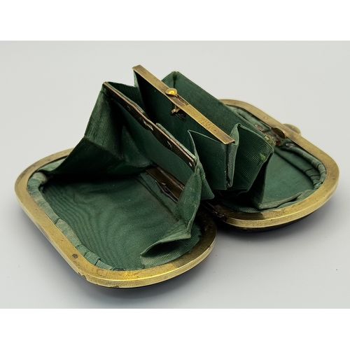 86 - An Antique (possibly French) Faux Tortoiseshell Small Purse. 
Silk interior is in fair condition for... 