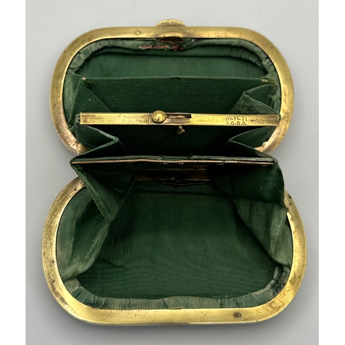 86 - An Antique (possibly French) Faux Tortoiseshell Small Purse. 
Silk interior is in fair condition for... 