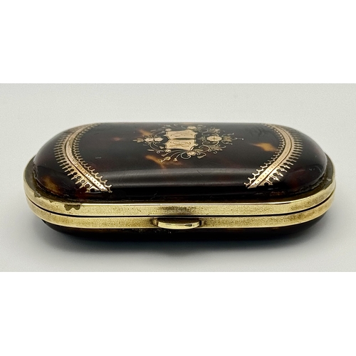 86 - An Antique (possibly French) Faux Tortoiseshell Small Purse. 
Silk interior is in fair condition for... 