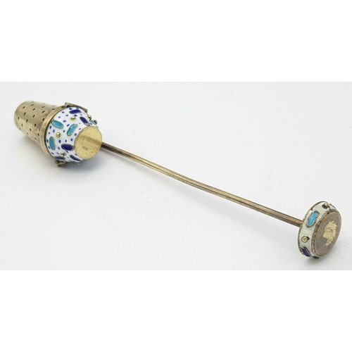 88 - An Antique Russian 916 Silver and Enamel Cloisonne Tea Strainer. 11cm. 18.7g.